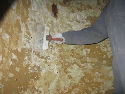 Worker prepping tank before lining process